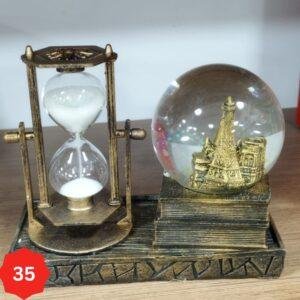 بلوره  مضيئة مع ساعة رملية